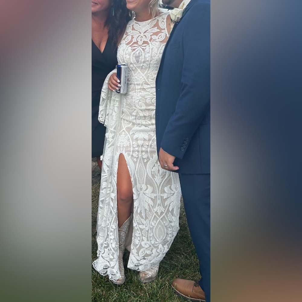 Lillian West size 10 wedding dress. Professionally altered. Added slit.